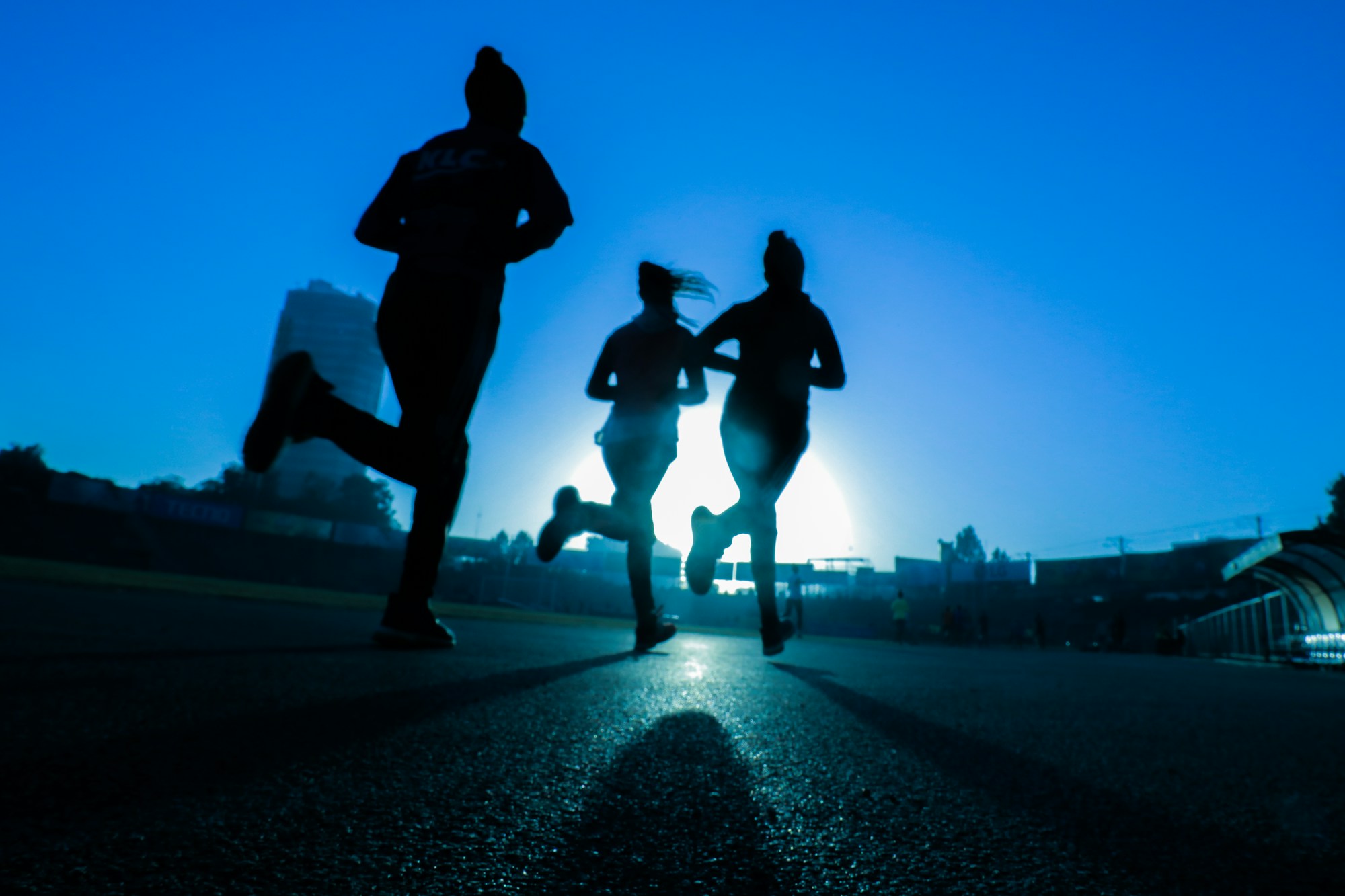 Runners heading out together in the early morning light